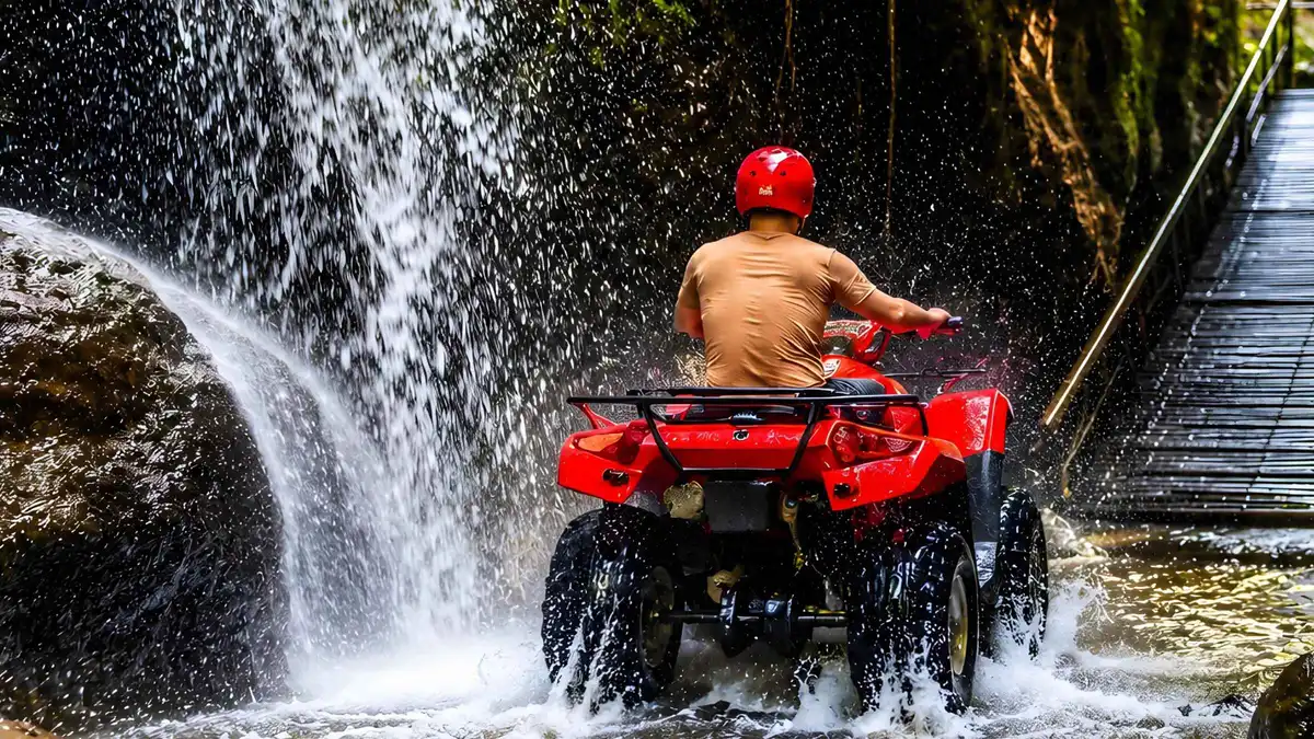Beginner riders lined up in helmets before a guided ATV tour in Ubud, Bali